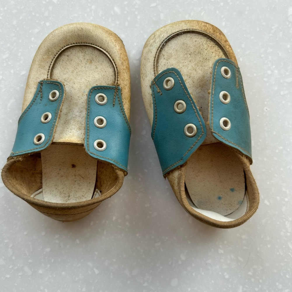 Vintage Collectible Blue and Tan Slip-On Baby Shoes with Metallic Eyelets